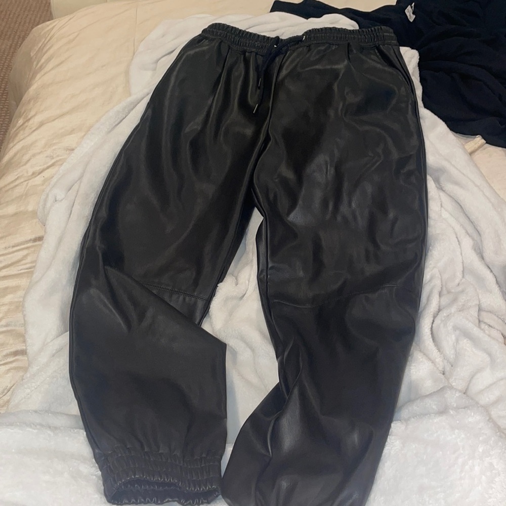 black leather pants (never worn) new with no tags.